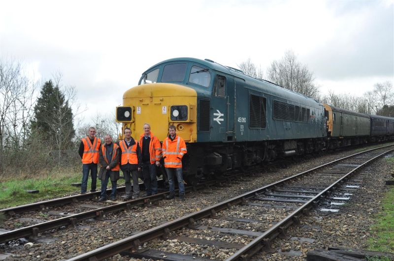 45060 'Sherwood Forester' with lucky owner Mike Jacob (centre), DR driver Keith Netherton (2nd left), and members of the Pioneer Diesels group who look after Sherwood so well. After a successful test drive, Keith has decided he'd like one, and is reaching for his chequebook.