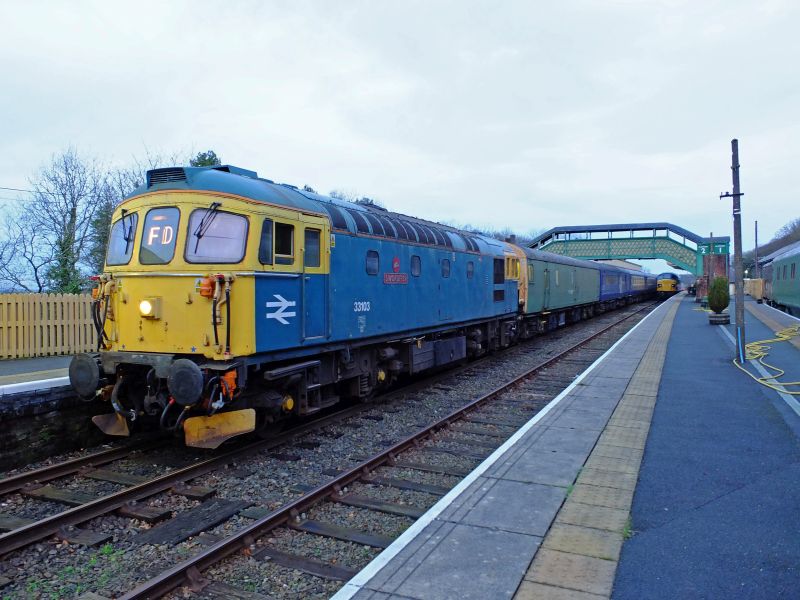 33103 'Swordfish' heads for Meldon with the last train of the day. 47701 'Waverley' is on the rear, whilst 45060 'Sherwood Forester' is admired in platform 2