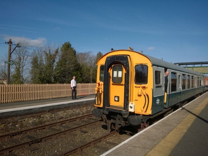 Duty manager Paul Martin and guard Don Bent with 4-CEP driving trailer 61743.