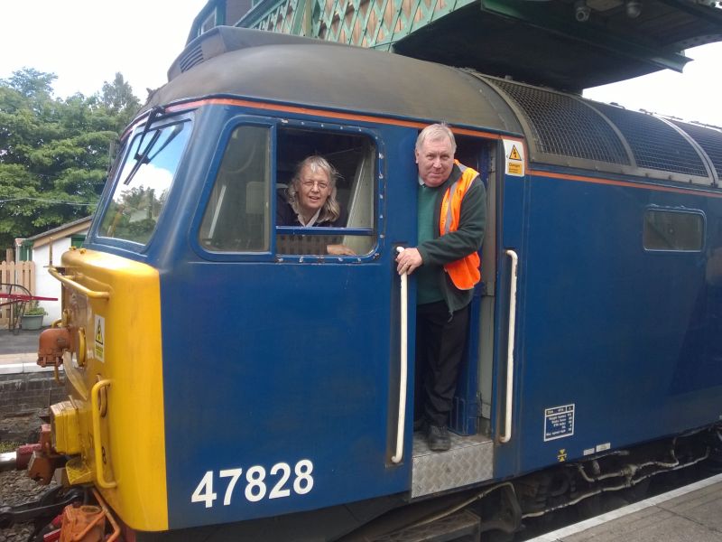 Rachael Wilson under instruction from Graham Isom in the cab of 47828