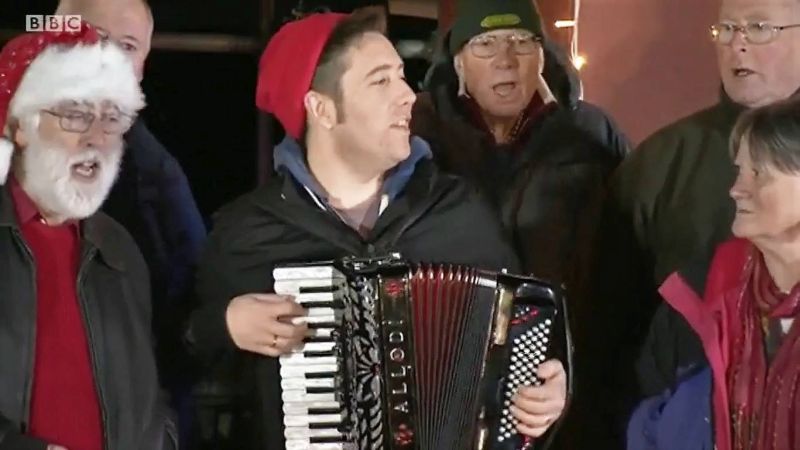 Renowned Devon folk singer Jim Causley (centre, with accordion) and, nearly as famous, DRSA's Peter Ritchie (DR woolly hat), performing at the North Pole