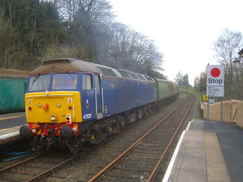 47828, DB 977335 (The Rocket) and 33035 arriving at Okehampton.