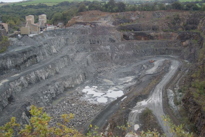 Quite a large hole in the ground. AI can expand downwards one more bench level. The building on the extreme left houses the 1974 Allis-Chalmers gyratory crusher - recently overhauled and now good for another 20 years.brPhotographer Jon KelseybrDate taken 30092017