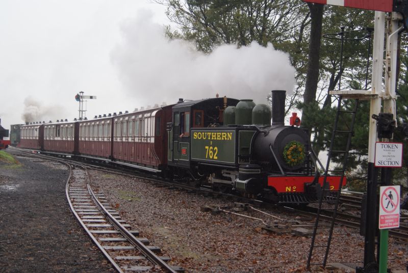 The world's newest steam engine at the rainy Lynton and Barnstaple steam gala. Replica Baldwin 2-4-2T no 762 'Lyn' at Woody Bay. Bagnall 'Isaac' is at the other end.