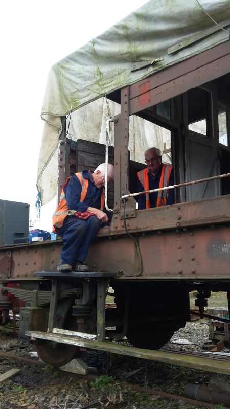 Patrick Doyle and John Coxon attacking yet another rusted-in bolt. The brakevan is now in the workshop.brPhotographer David BellbrDate taken 26102017