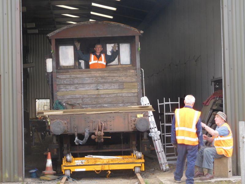 John Davis signals the end of another day's work on the SR brakevan LDS 55625. Patrick Doyle and David Bell seem unimpressed.brPhotographer Geoff HornerbrDate taken 19072018