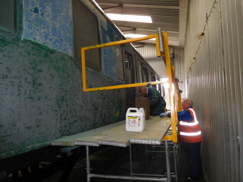 Thumper 1132 being repainted in the Meldon workshop. Nigel Green at work, Alan Harris supervising.brPhotographer Geoff HornerbrDate taken 19072018