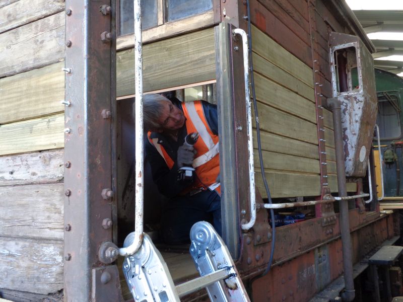 John Davis fitting prepared boarding to to the cabin door areabrPhotographer David BellbrDate taken 02082018