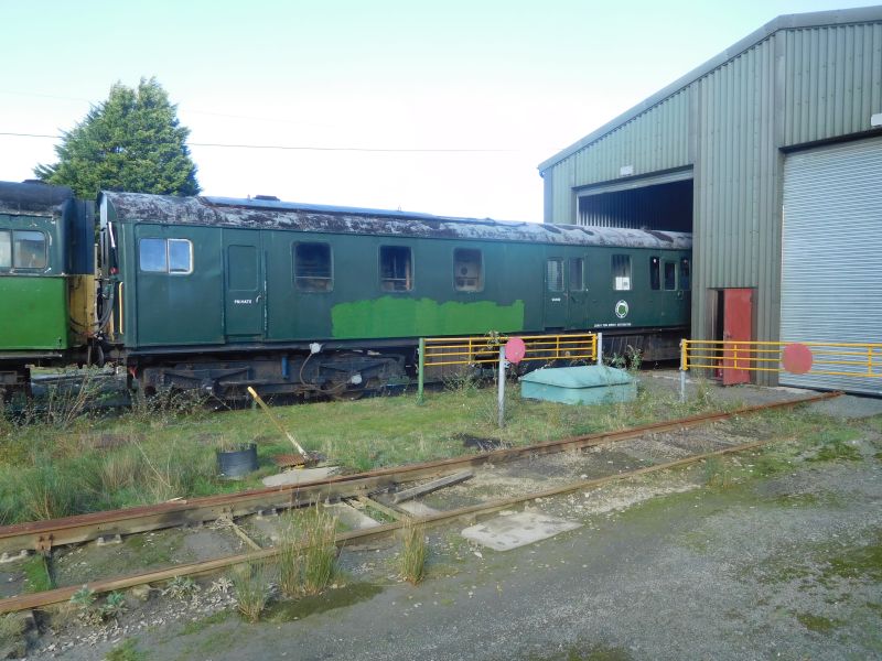 The power car going in to the shed to become the next CW project. The lighter green patches were applied to hide a recent graffiti attack.brPhotographer Geoff HornerbrDate taken 19102018