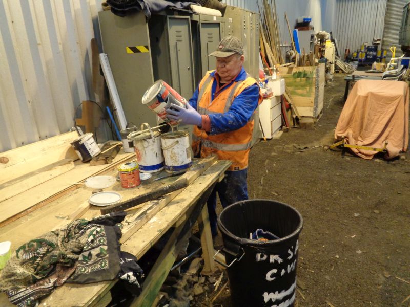  Alan Harris squeezes out the last drop of grey topcoat in order to continue painting the interior of the Thumper's guard's compartmentbrPhotographer David BellbrDate taken 06122018