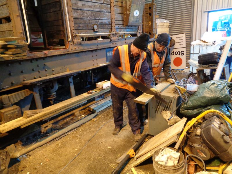 Patrick Doyle and John Davis cutting floorboards for one of the verandas on the SR brake van. The flooring of the cabin has been completed to a high standard.brPhotographer David BellbrDate taken 25012018