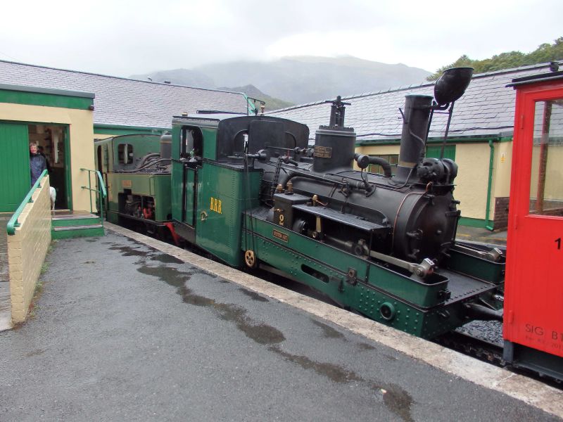 Snowdon Mountain Railway at Llanberis. Swiss Brienz Rothorn Bahn no 2 and SMR no 3 'Wyddfa'. No 2 was visiting briefly as part of a Swiss holiday promotion. BRB and SMR use the Abt rack and pinion system for dealing with steep gradients.brPhotographer Tom BaxterbrDate taken 15092018
