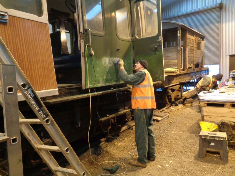 Nigel Green on the South side of the Thumper working bottom upwards with a sander.brPhotographer David BellbrDate taken 03012019