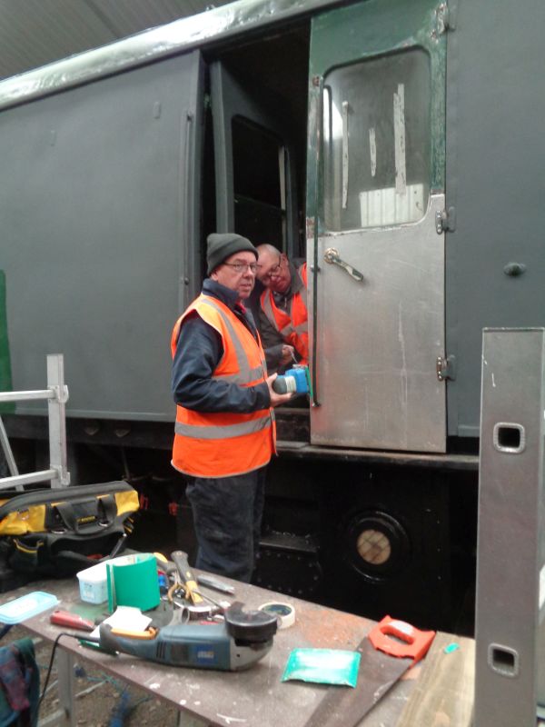 A Proper Job Ron Kirby and Paul Vodden buff the edges of the new metalwork for a perfect fit.brPhotographer David BellbrDate taken 09052019