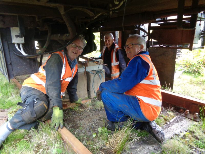 A trio of happy volunteers under FK S13436 seemingly pleased with a successful day's work. Or were they merely happy that they were dry whilst the photographer was getting a soaking in the rainbrPhotographer David BellbrDate taken 20062019