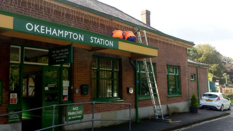 Paul Vodden and Tom Baxter on top of the Okehampton station entrance canopy clearing the drainage channel.brPhotographer Jon KelseybrDate taken 04092019