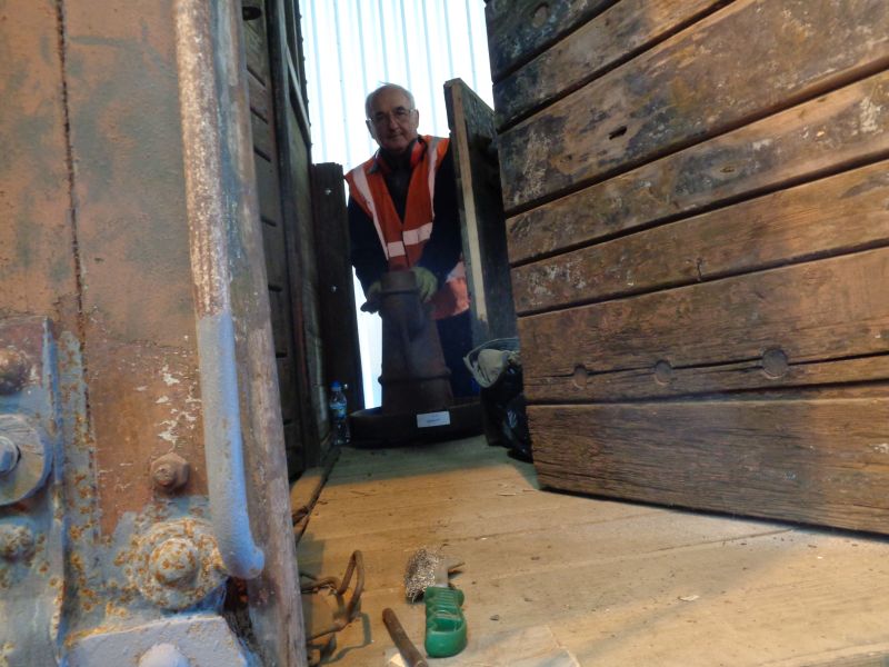 Patrick takes a breather before shuffling the stove into the cabin.brPhotographer David BellbrDate taken 12032020