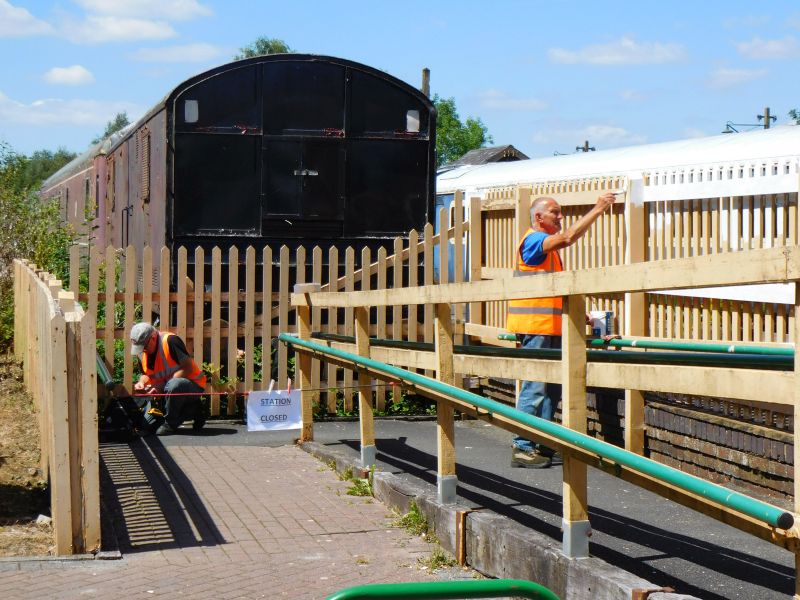 Paul and Geoff at work at the Platform 2 entrance.brPhotographer Jon KelseybrDate taken 22072020