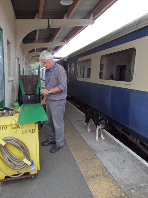 The website editor painting a sign, with a miraculously clean paintbrush. The train now standing in platform 2 ...brPhotographer Tom BaxterbrDate taken 02092020