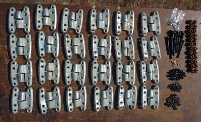 Parts of twelve pairs of self-aligning hinges have been electroplated in black and clear zinc.