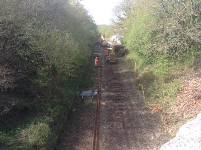 Looking west from Sampford Courtenay main road overbridge with roadrailers regrading the trackbed etc for 55mph running.brPhotographer Tony HillbrDate taken 04052021