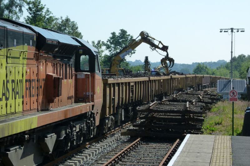 Scrap rail materials being loaded at Okehampton. Colas class 70 70812.brPhotographer Dave EllisbrDate taken 23062021