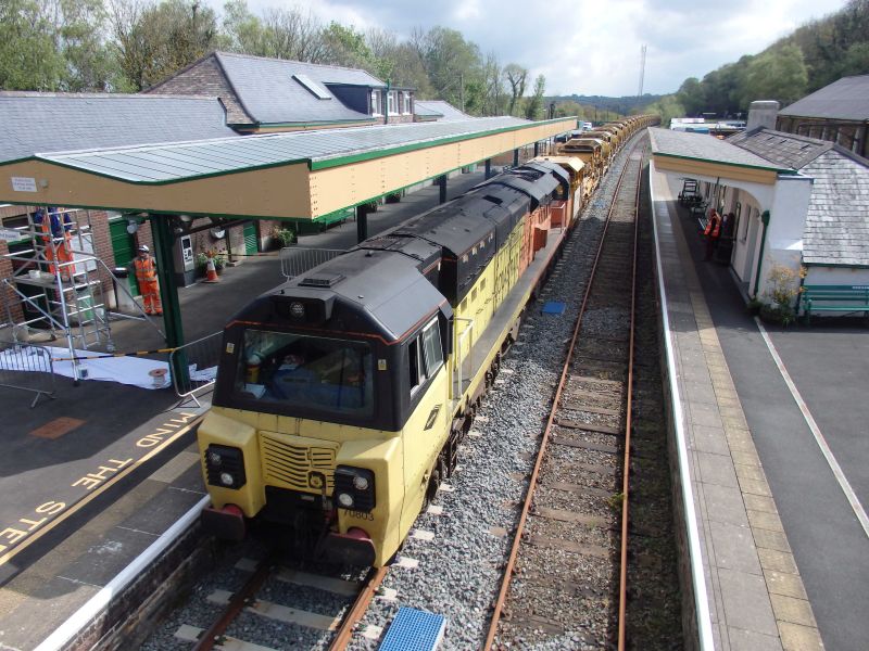 70803 with the HOBC at Okehampton Station. Also apparent is the much improved Platform 3 building roof and canopy.brPhotographer Tom BaxterbrDate taken 27042022