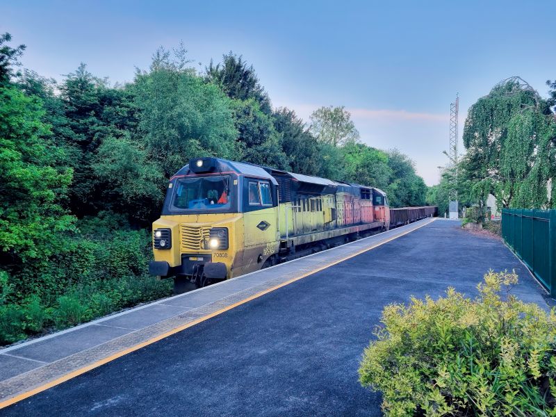 Early morning at a verdant Sampford Courtenay. Colas Rail Freight 70808 working 6C22 from Okehampton to Westbury with spoilballast from recent blockade works near Fatherford.brPhotographer Alan PetersbrDate taken 22052022