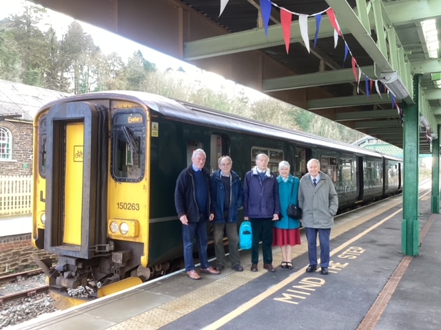 Former BR SR and WR Exeter Area railway staff, from left Tony Hill, Graham Robinson, Richard Westlake, Mrs Ruth Letten, Roy Letten, prior to the official opening of the Okehampton station Booking Office Museum by Richard Westlake.brPhotographer Courtesy of Tony HillbrDate taken 21122022