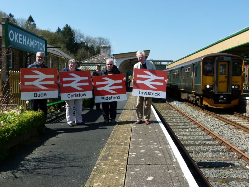 L to R Mike Moore of Connect Bude, stalwart local Councillor Julie Yelland of Okehampton with the Christow sign, Alan Clark of ACERail and Richard Searight of TavyRail.brPhotographer Dave EllisbrDate taken 20042023