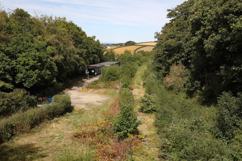 Compare the previous view with the present day just 8 years later. I think the single line track is still there now lost in the jungle that has overtaken the view. I had no idea this had changed so much with the growth. A lot of work will have to be done if ballast trains are to run again from Meldon Quarry. brPhotographer Bernard MillsbrDate taken 01082026