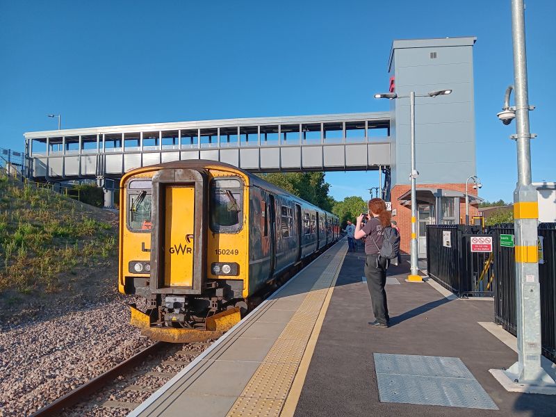 On the day public services began using the new Okehampton Interchange station, the first up train of the day was the 0722 Okehampton - Exeter service formed by class 150 150249.brPhotographer Sue BaxterbrDate taken 01082026
