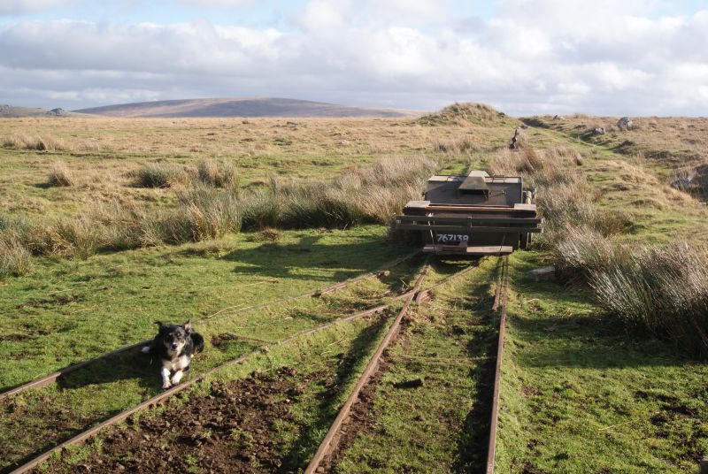 View east from the shed. The railway runs parallel with, and to the right of, the protective embankment seen starting in the middle distance. Firing was from the left. Cosdon hill is in the left background.brPhotographer Jon KelseybrDate taken 14112018