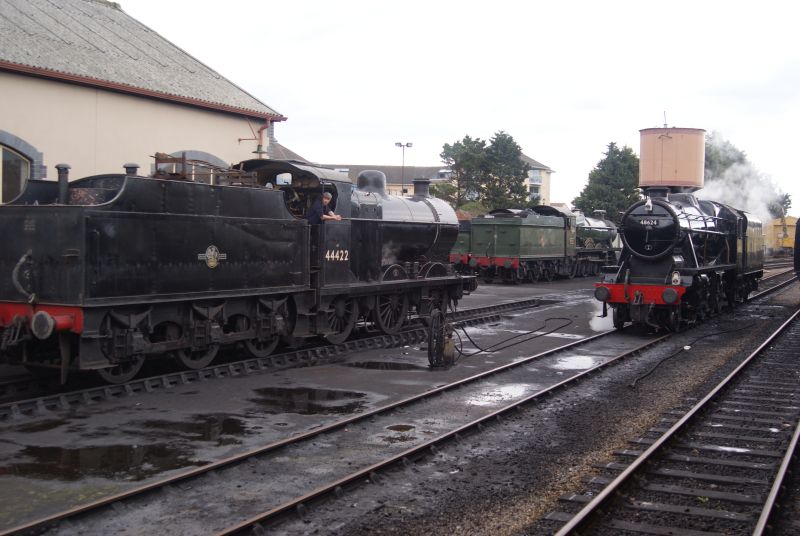 Scene at Minehead shed with LMS Fowler 4F 0-6-0 no 44422, GWR 4-6-0 no 4936 'Kinlet Hall' not in service on the day and LMS Stanier 8F no 48624 brPhotographer Jon Kelsey