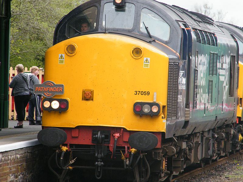 37059 leads the Pathfinder Devon Explorer into Okehampton station.