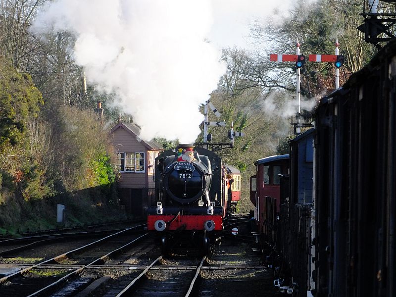 GWR 4-6-0 no 7812 Earlstoke Manor arriving at Bewdley from Kidderminster, passing the array of signals and Bewdley South Signalbox 