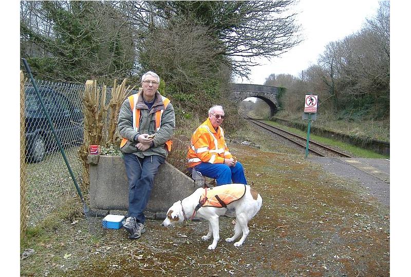 Rosie puts on a 'hang dog' expression to get George Ware's lunch, having already blagged Geoff Horner's.brPhotographer Sue BaxterbrDate taken 02032013