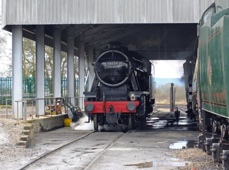 LMS Stanier 8F 2-8-0 48624 and SR Bulleid Battle of Britain class 4-6-2 34070 Manston at Bishop's Lydeard. The 8F is an honorary Southern engine, having been built at Ashford in 1943. It is based on the Great Central Railway, and was a last minute stand-in for a Black 5. Mercifully the crimson livery it carried recently has been overpainted with something more authentic.brPhotographer Philip Wagstaff