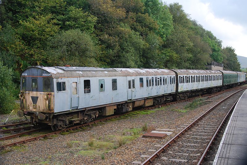 Bumper Thumper at Meldon during the Not the Last Thump event. This is 1128 as a 3-car unit plus 1132's middle car, but confusingly it's the green one which is 1128's middle car. So left to right the vehicles are 60146 (1128), 60677 (1132), 60673 (1128), 60827 (1128).