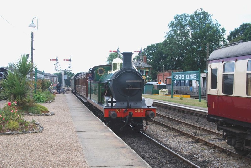 South East & Chatham Railway 'H' Class 0-4-4T no. 263 enters Horsted Keynes on the Bluebell Railway with an East Grinstead bound service. Note the period coaches at the front. Horsted Keynes is quite an extensive station for a heritage railway with five platforms. 