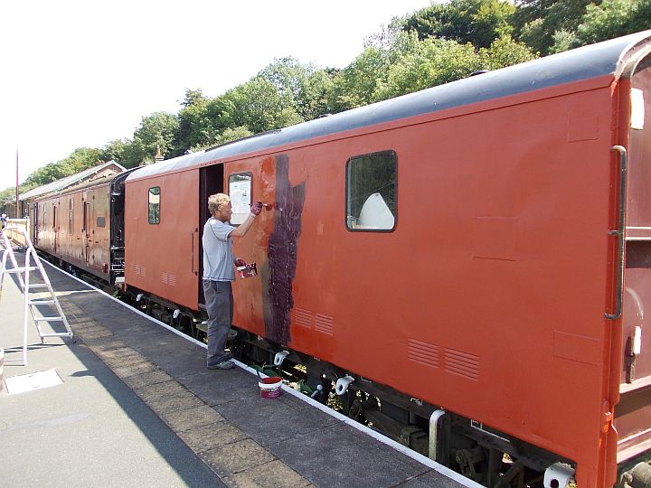 Paul finishing off the red oxide primer on the platform side.brPhotographer Jon KelseybrDate taken 11082012