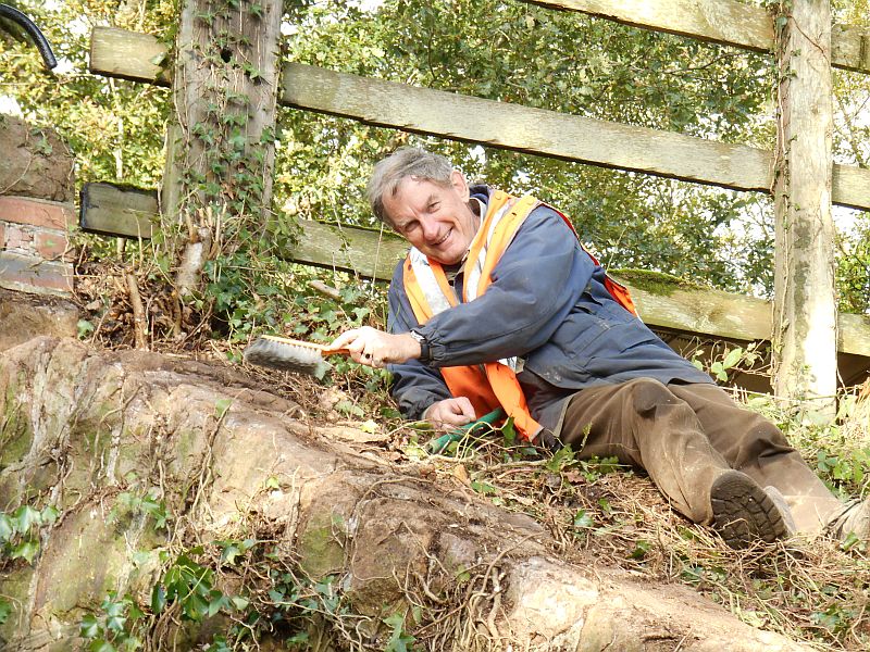 Andy Turner putting the finishing touches to the parapet of Broad Nymet Farm Underbridge 587, virtually invisible at the start of the day.brPhotographer Sue BaxterbrDate taken 29102013