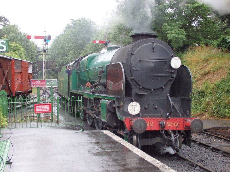 SR 'LN' Class 4-6-0 no 850 'Lord Nelson' approached to couple onto its train at Alresford. Lots of SR detail around with cast iron signs, LSWRSR lower quadrant signals, SR type metal fencing, plus a superbly restored BR Cattle Wagon as an added bonus. brPhotographer Tom BaxterbrDate taken 24072015