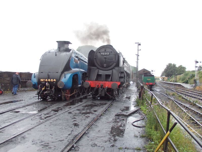 LNER A4 Pacific no. 4464 'Bittern' and BR 9F 2-10-0 no. 92212 in Ropley shed yard. Rear of SR Schools Class 4-4-0 no. 925 'Cheltenham' in the distance. brPhotographer Tom BaxterbrDate taken 24072015