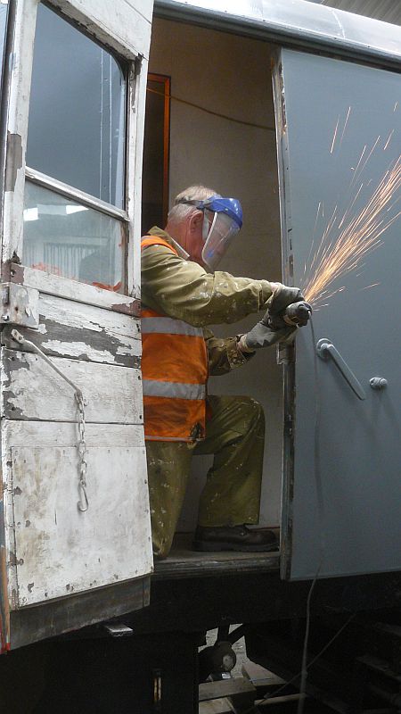 Phil Hull busy tidying up one of the door frames.brPhotographer Geoff HornerbrDate taken 18072013