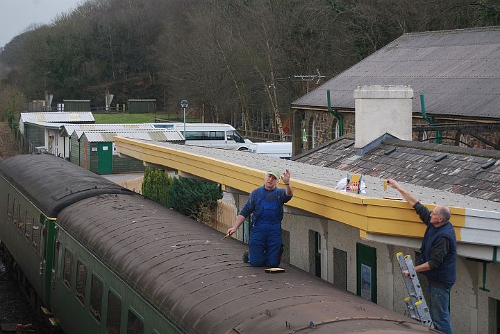 Tom Baxter l and Geoff Brooks paint the Okehampton platform 2 canopy.brPhotographer Sue BaxterbrDate taken 09032013