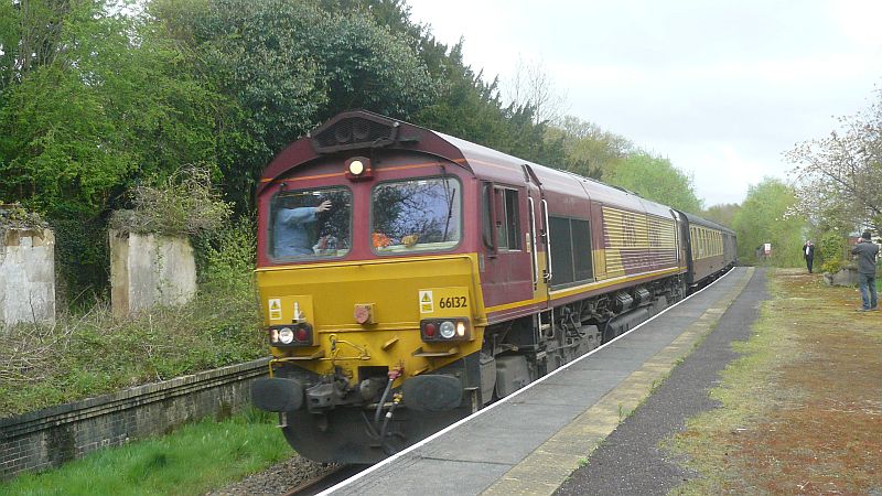 Class 66 66132 heads Steam Dreams' 'Cathedrals Explorer' back to Exeter at Sampford Courtenay. 