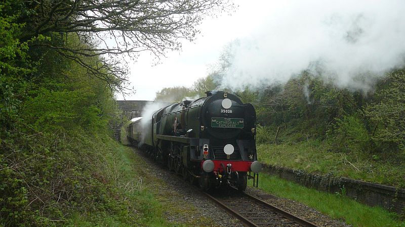 SR Merchant Navy pacific 35028 'Clan Line' at Sampford Courtenay bringing up the rear of Steam Dreams' 'Cathedrals Explorer' railtour on the return leg to Exeter.