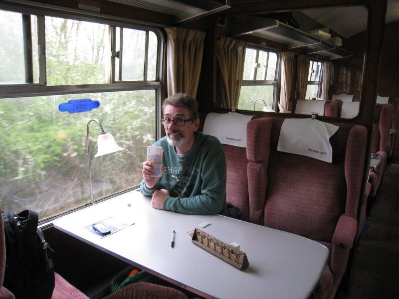 Mark Williams and John Caesar got on the Devon Explorer at Exeter to sell tickets for Meldon. Chris Peters and Roger Webster did likewise at Crediton. Here's Mark with a fistful of the takings.