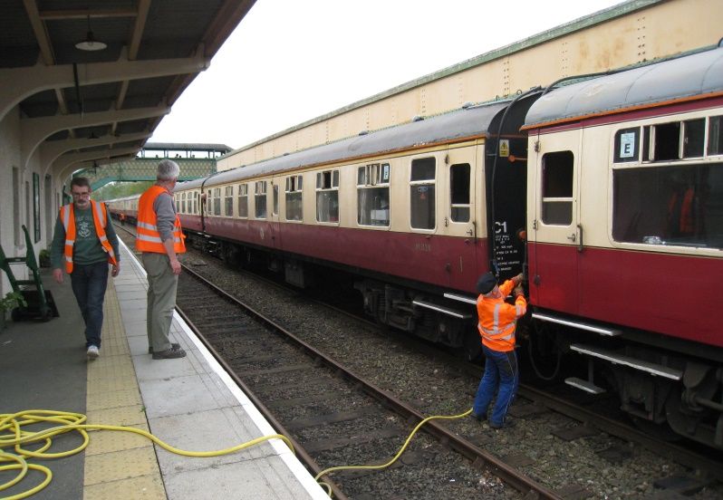 While the Devon Explorer was at Okehampton, the DRSA Station Maintenance team refilled the coach water tanks. Here are Williams, Kelsey and Baxter in action.